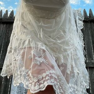 Forever 21 white lace dress, has ties to cinch waist, tassels on neckline